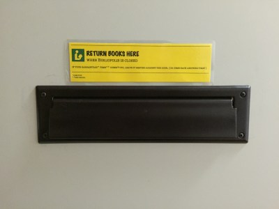 bibliopolis book drop sign